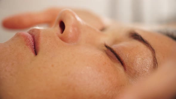 Female Facial Massage Closeup