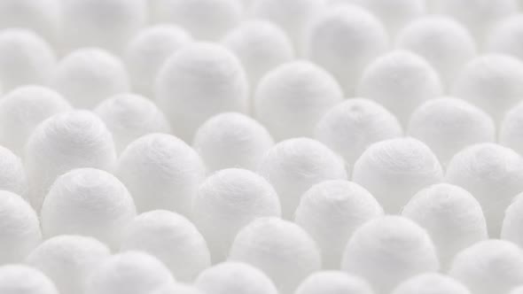 Closeup Spinning Fullframe Macro Background of Cotton Earbud Heads