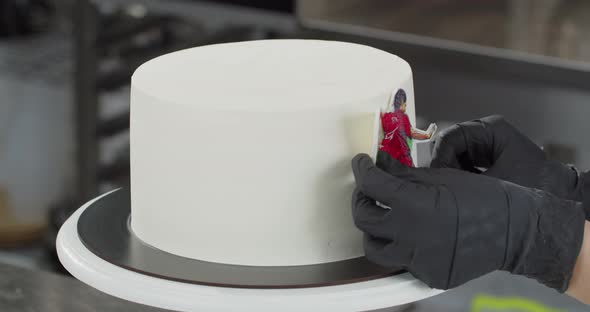 Professional Confectioner Decorates a Holiday Cake