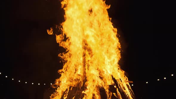 Big Bonfire Burning at Night. Slow Motion. The Big Fire Background.