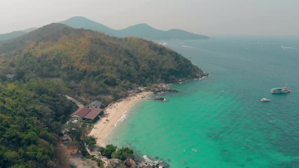 Yellow Sandy Beach Near Turquoise Ocean Water Upper View