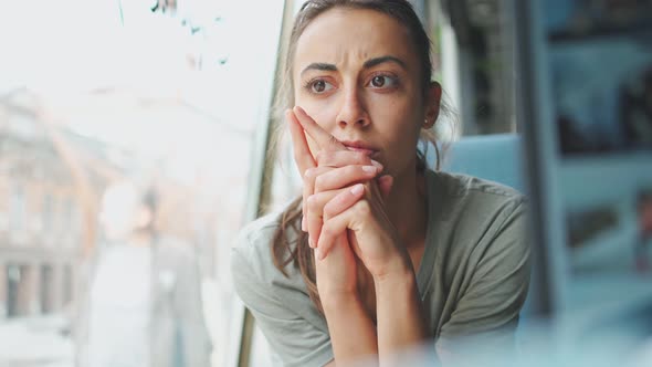 Worried Business Woman Face Looking at Laptop in Office