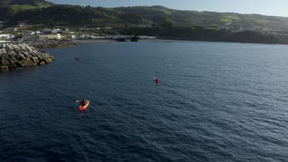 Aerial view of people doing kayak in Azores, Portugal.