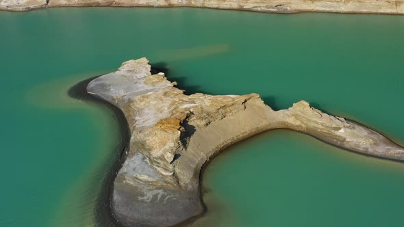 Drone View of the Turquoise Lake Formed As a Result of Mining Waste