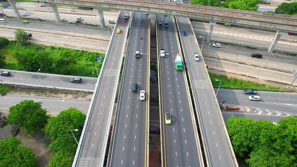 4K : Aerial view shot of fast moving Highway road