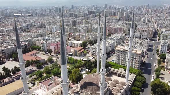 Aerial view of mosque and panorama of city. Mugdat Mosque, Mersin, Turkey