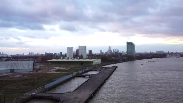 Aerial shot of an East London industrial construction site with warehouse