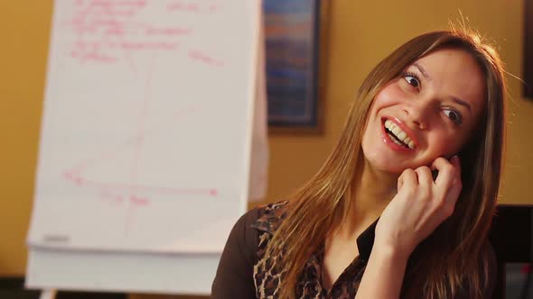 Attractive Young Woman Smiling Laughing Winking, Talking Phone