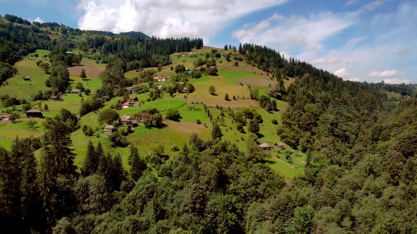 Slopes of Mountain Covered with Forests Aerial View