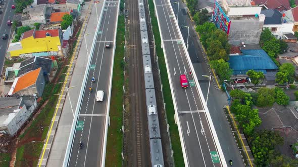 Aerial view of infinity sign traffic junction cross road with car transport.