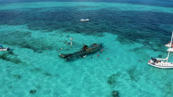 Aerial View of Snorkeling in the Caribbean Sea Near the Sinked Ship