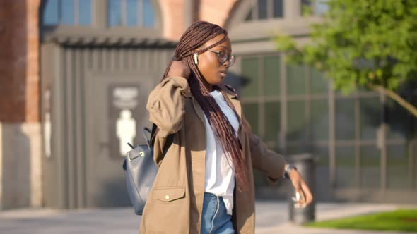 Young African Female Student Late for Classes Running on University Campus