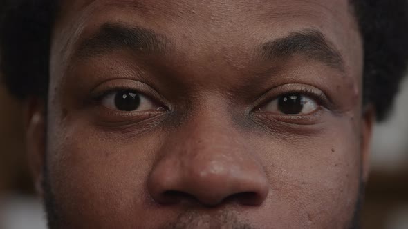 Surprised African American Man Eyes with His Eyebrows Up and Blinking