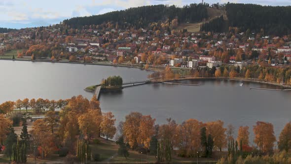 City of Ostersund and lake Strosjon in aerial drone view