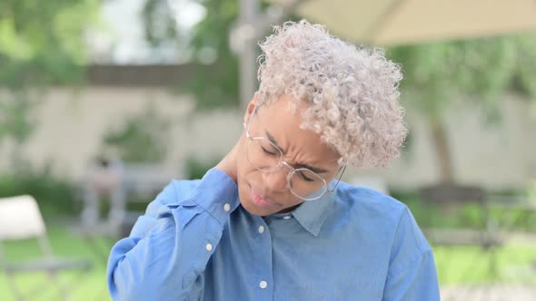 Portrait of Young African Woman Having Neck Pain