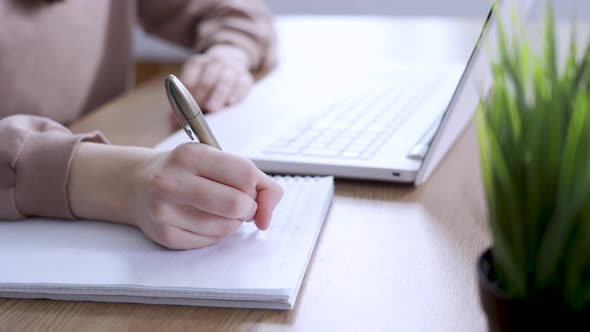 Young Student Woman Write or Draw in Note Book