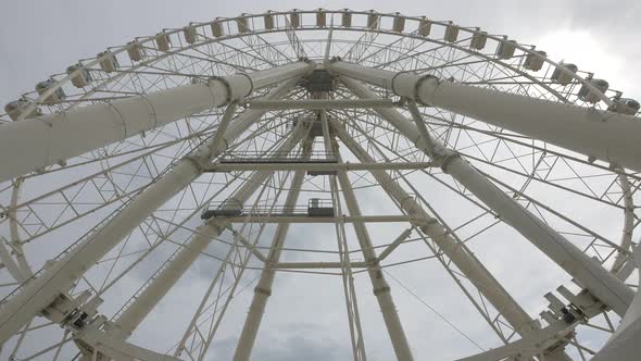 Low angle of a Ferris Wheel rotating