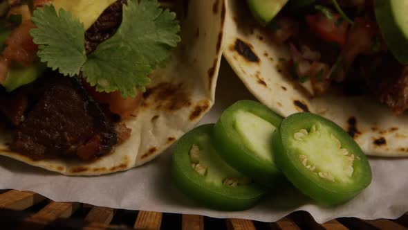 Rotating Shot of Delicious Tacos on A Wooden Surface