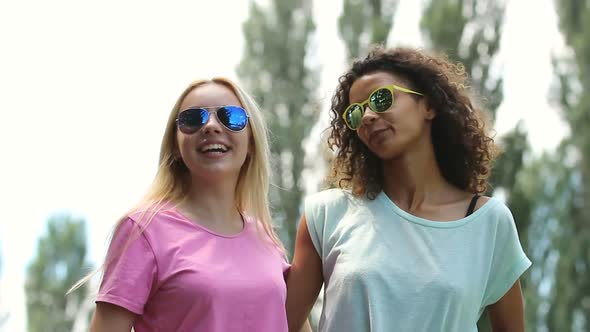 Two Best Girlfriends Making Dance Moves, Taking Funny Selfies With Smartphone