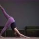 Lonely Woman in Sportswear Doing Side Plank in a Spacious Yoga Studio - VideoHive Item for Sale