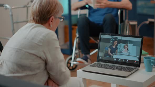 Elderly Woman Meeting on Online Videocall with Family