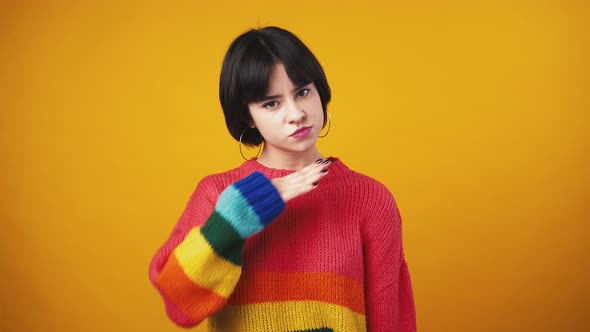 Grumpy Young Woman Feeling Annoyed Showing Fed Up Gesture Touching Her Neck Orange Background