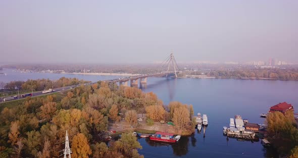 Autumn Kiev Ukraine. Drone Flight To the South Bridge with a Beautiful View of Yellow Trees, Soft