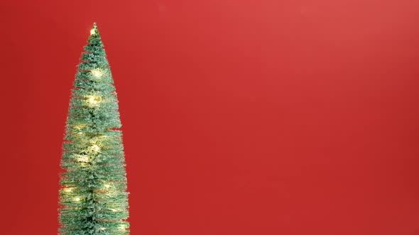 Christmas Tree Flashing Garland Red Background