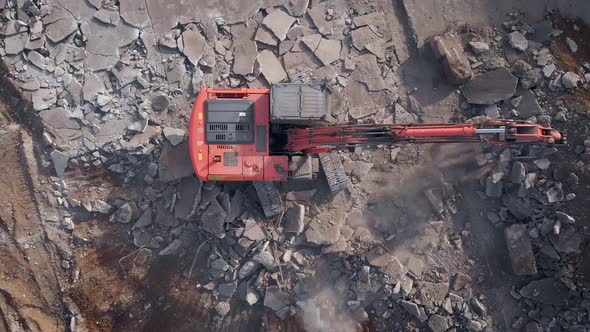 Air View. Demolition Work Is Carried Out with the Help of an Excavator. Heavy Machinery