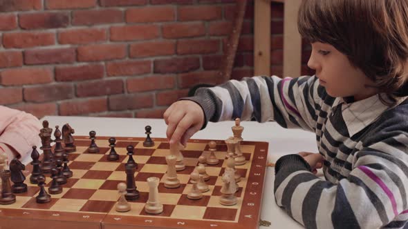 Two Boys Playing Chess