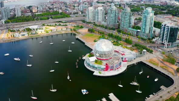 Boats On False Creek With Science World And Apartment Buildings In Downtown Vancouver, BC, Canada. -