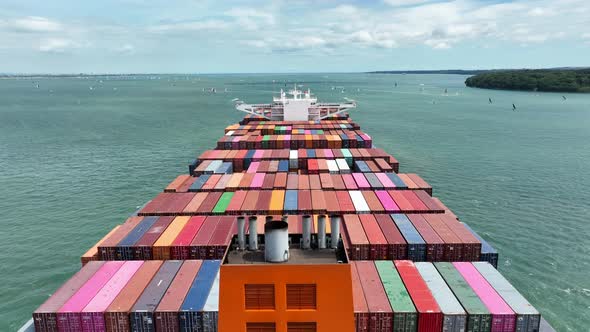 Fully Loaded Container Ship at Sea Transporting Cargo Around the World