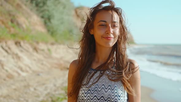 Slow Motion of Happy Joyful Slim Fitbody Woman Wearing in Bikini and Enjoying Wind and Waves on Sea