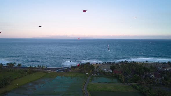 Kites Fly on the Ocean Shore Near the Rice Terraces