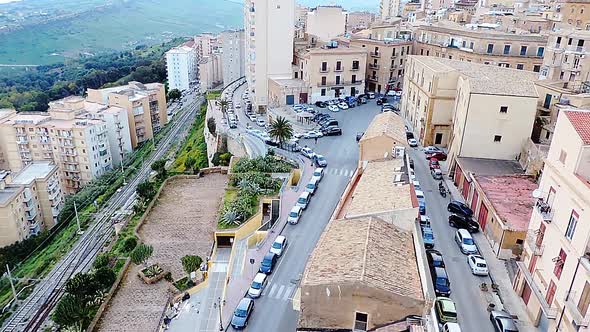 Looking from the windows of a hotel looking down on the hill top city Agrigento and the valley below