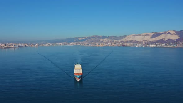 Aerial View of Container Ship Floating with Cargo From Commercial Sea Port