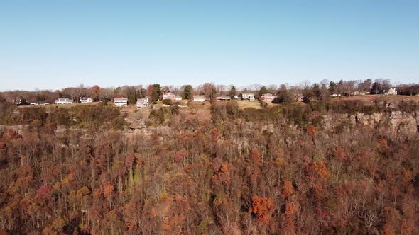 Right to left trucking aerial. Signal Mountain in Chattanooga Tennessee. Clifftop homes seen during