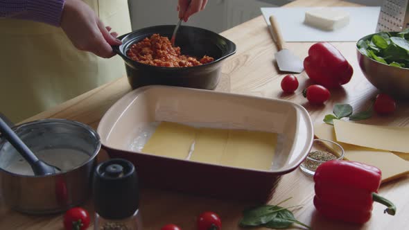 Woman Is Mixing Hot Sauce