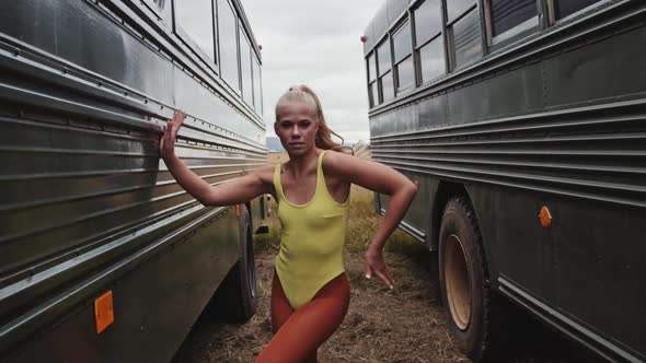 Blond Dancer In Yellow Dancing To Camera