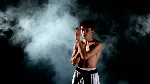 Karate or Taekwondo Man. Smoke, Close Up