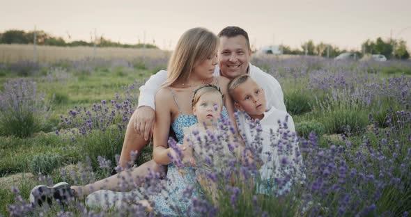 Portrait of a Young Family on a Lavender Field