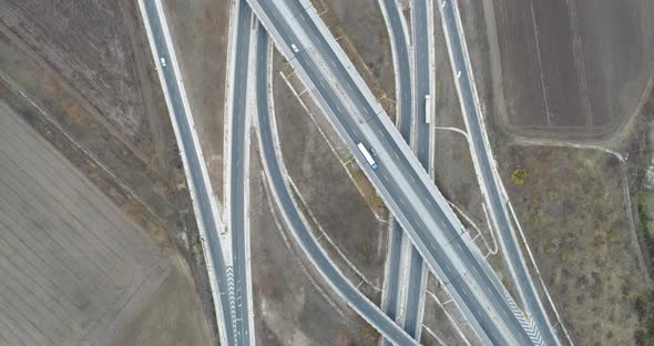 Aerial view of highway and overpass. Road junction, highway intersection top view.