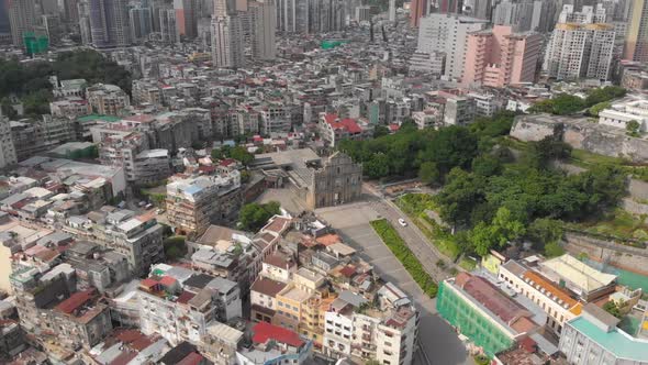 High angle aerial view orbiting famous Ruins of Saint Paul's, Macau