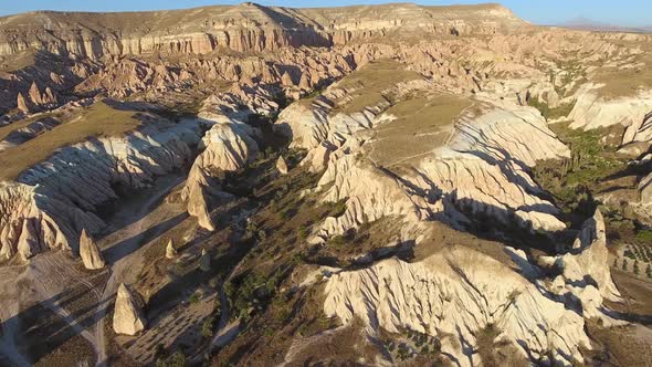 Hoodoos, Fairy Chimneys and Sedimentary Volcanic Rock Formations in Eroded Cappadocia Valley, Turkey