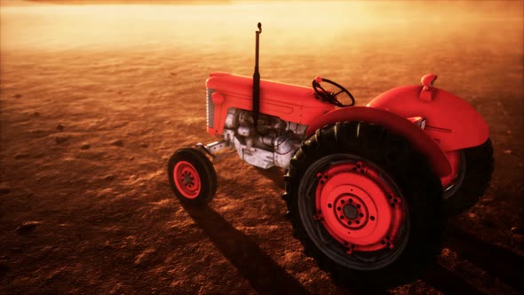 Vintage Retro Tractor on a Farm in Desert