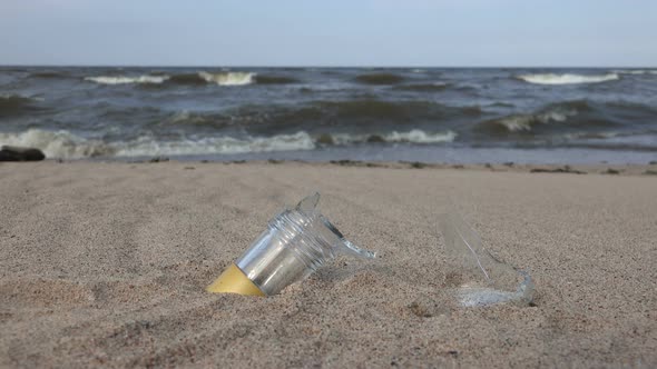 Broken Glass On The Beach