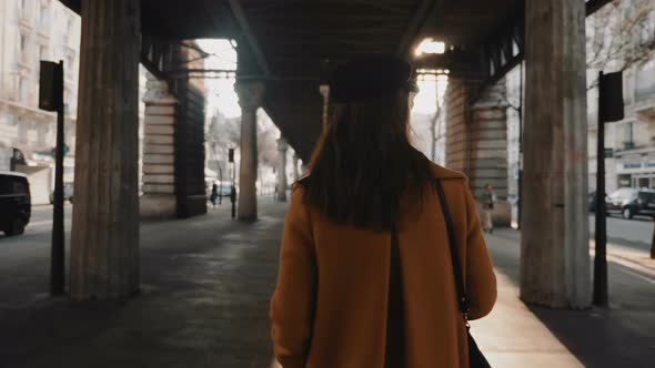 Rear View Happy Stylish Fashion Blogger Woman Exploring Paris Streets Under Sunny High Line Metro