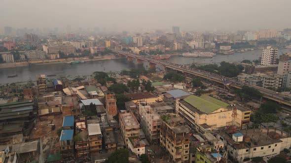 Aerial Rooftop Views Of Buildings Near Dhaka City River Port At Dhaka In Bangladesh. Pedestal Up