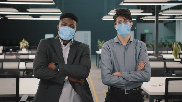 Two Businessmen African Arabian Colleagues Business Partners Managers Wearing Face Masks for Protect