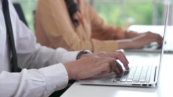 Close Up Shot of Business People Hand Typing and Working Actively